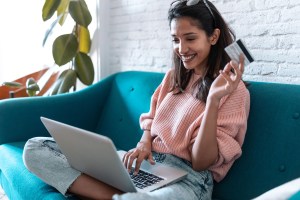 women holding credit card